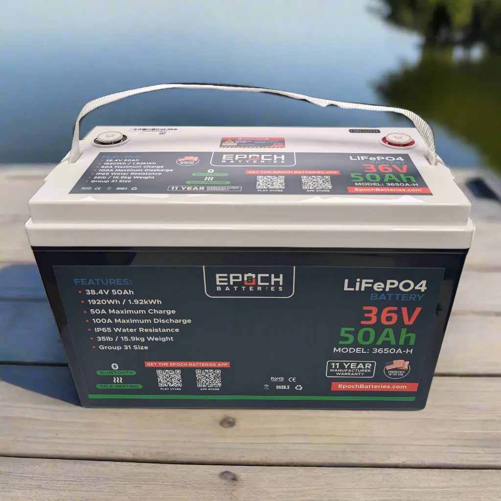 Epoch LiFePO4 battery on a wooden surface with a blurred natural background