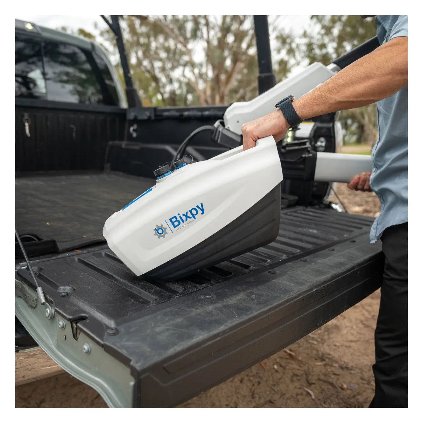 Carrying the Bixpy NB-1440 battery by its handle