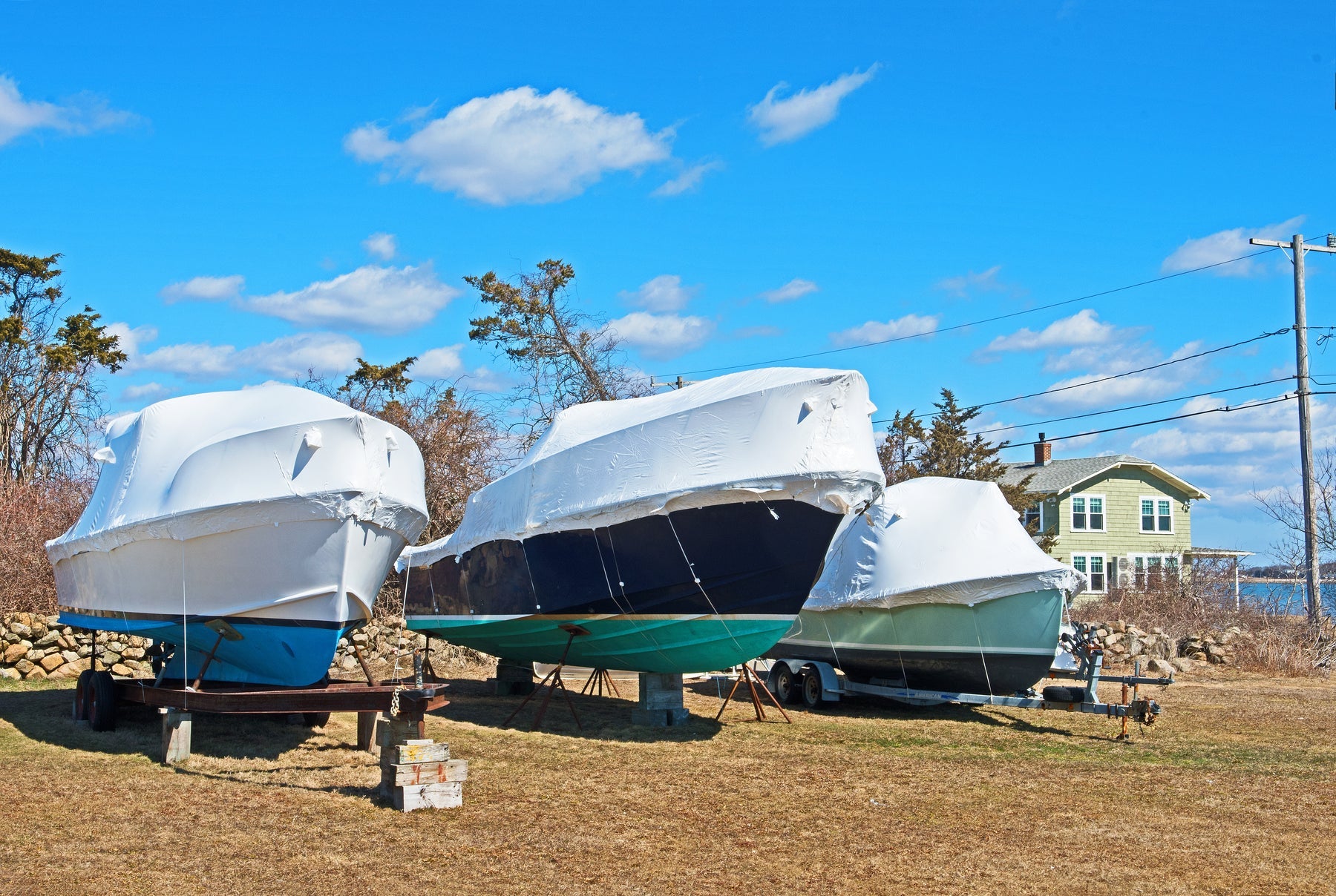 Boats shrink wrapped and stored on blocks for the winter