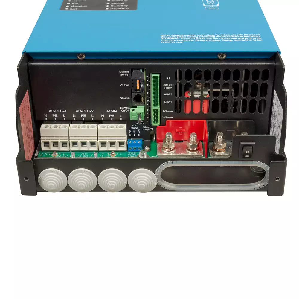 MultiPlus-II terminal compartment showing AC input, AC output, and battery cable connections